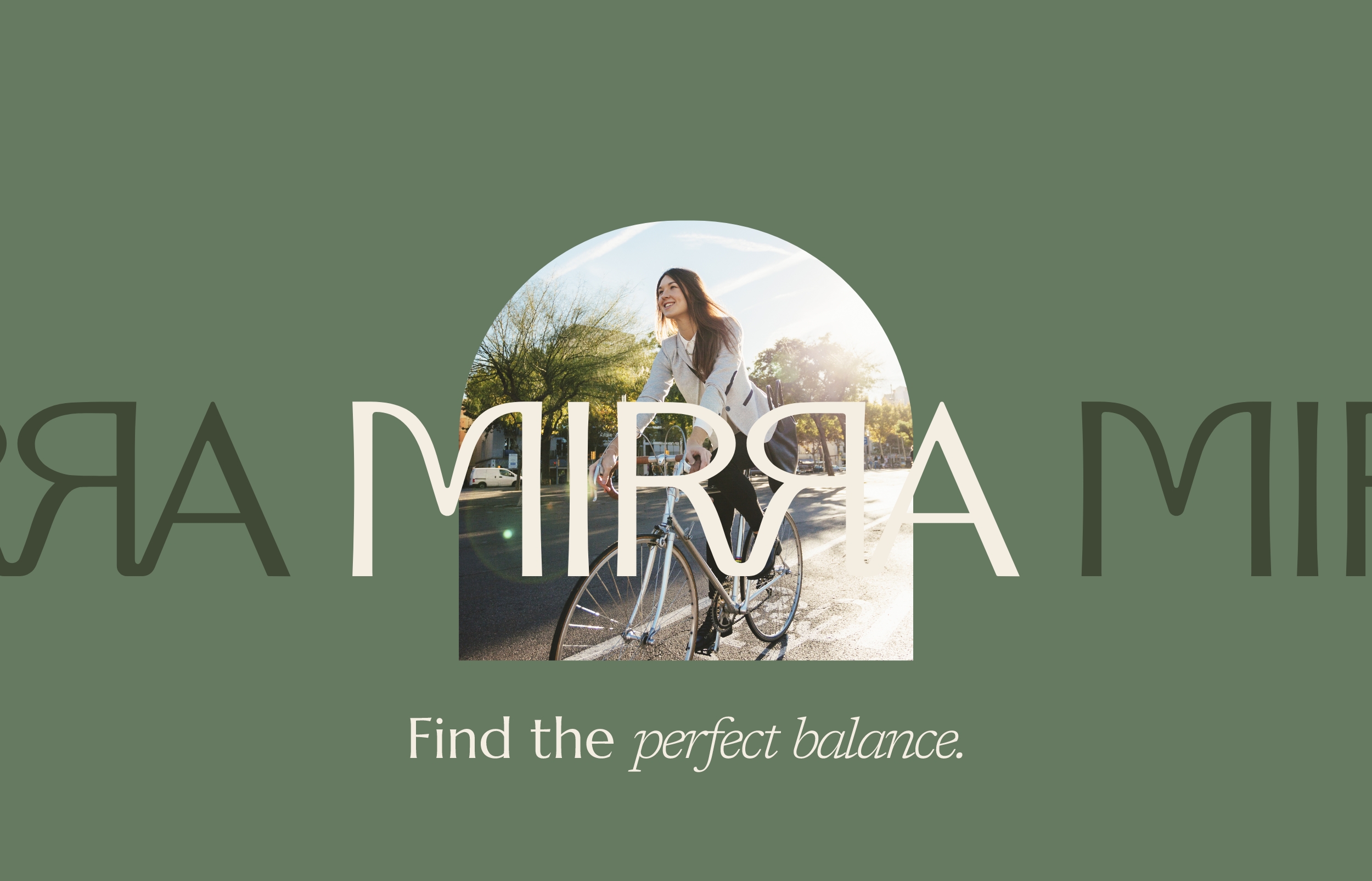 Woman on bike. Text: Find the perfect balance. Mirra logo.